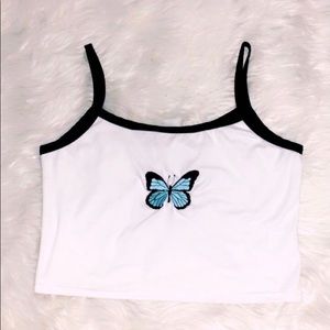 butterfly blue, white, and black tank.